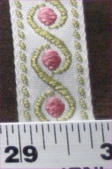 White with gold and pink trim